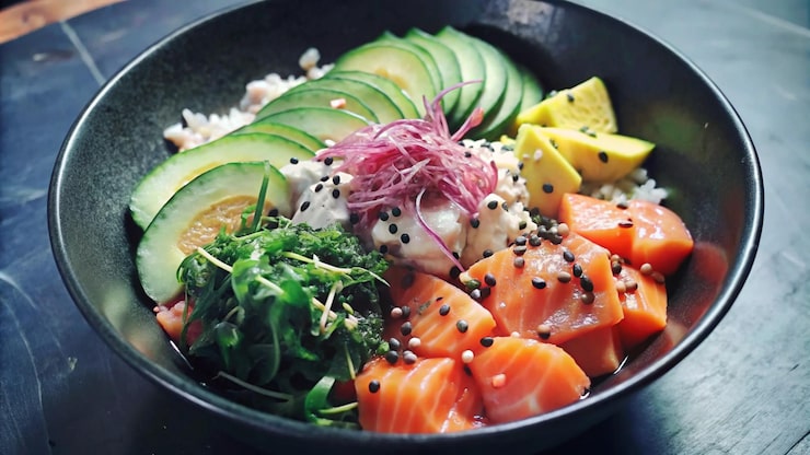 Six super foods that lower cholesterol including salmon and nuts